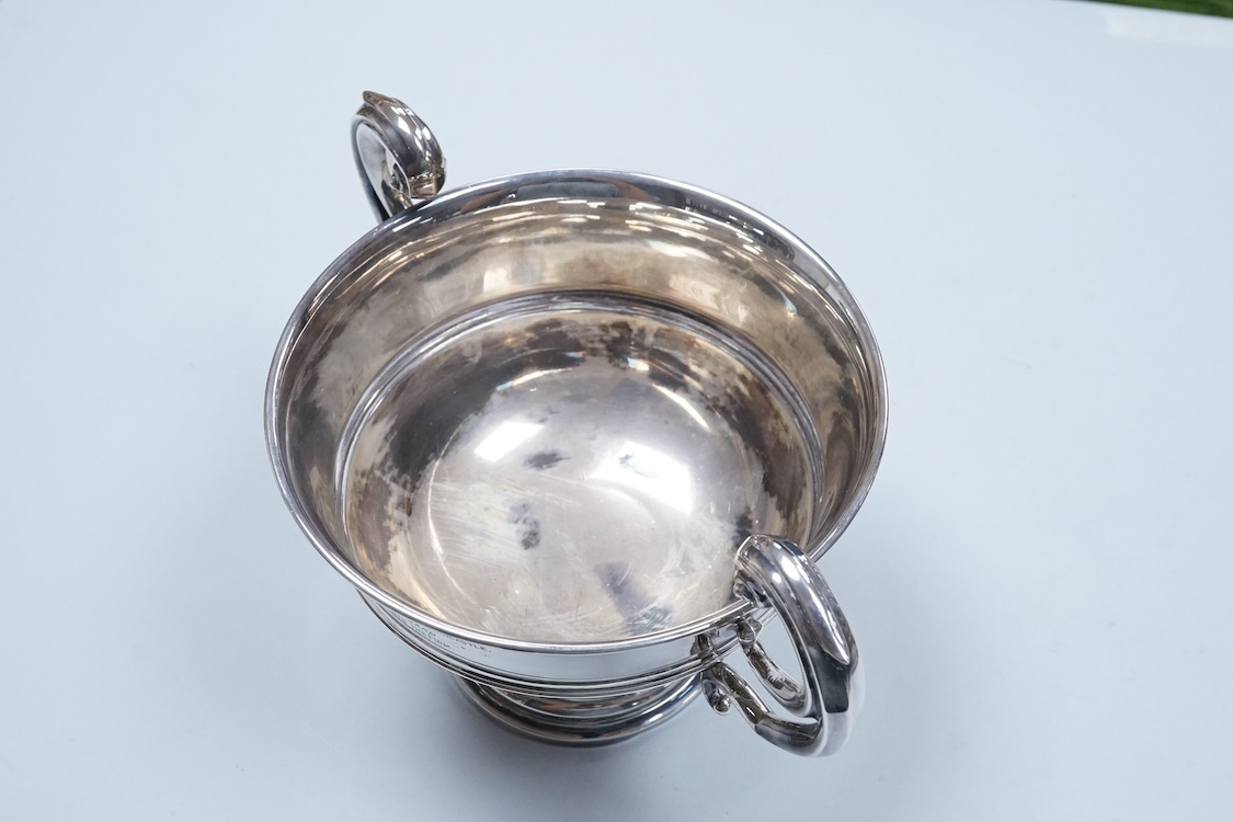 An Edwardian silver two handled presentation pedestal bowl by James Dixon & Sons, Sheffield, 1907, with engraved inscription, diameter 14.8cm excluding the handles, 14.3oz.